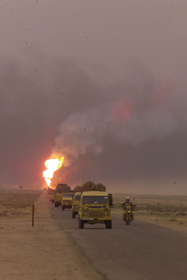 Elements of the British Army moves North past the gas, oil serperation plants in Southern Iraq, 22nd March 2003. (U.S. Marine Corps photo by Sergeant Kevin R. Reed)