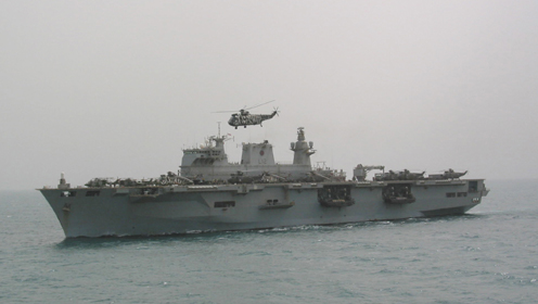 HMS Ocean cruises off the coast of Kuwait,  12th March 2003. Pphotograph copyright Tim Ripley