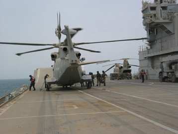 Westland Merlin MPH Mk1 helicopter lands on HMS ARk Royal off the Kuwaiti coast, 12th March 2003. Photograph copyright Tim Ripley